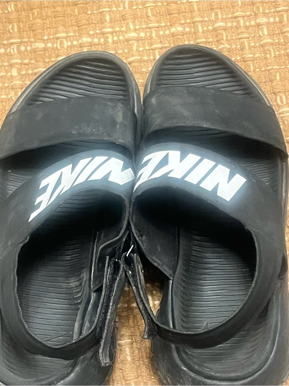 Nike Black Slide Sandals with White Size Labeling